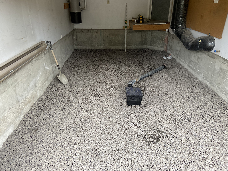 Travaux preparation coule et finition de beton a Longueuil - Briser et sortir le vieux béton du garage, remplacer la roche, coule et finition de béton