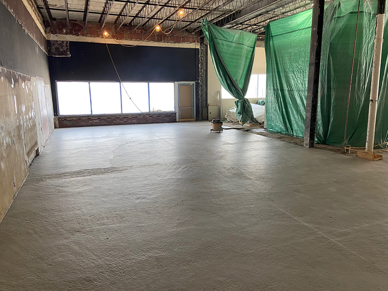 Mise en place et finition de beton 3000 pieds carres a Montreal - mise en place et finition du béton et traits de scie 15x15. travaux de coule et finition de béton effectués à Montréal