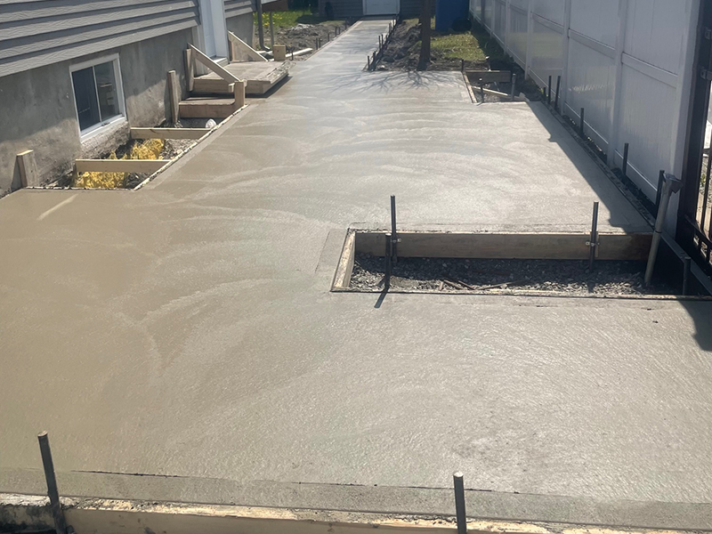 Coule et finition de beton residentiel a Longueuil - Travaux d'excavation, coffrage, installation d'armature, mise en place et finition de béton à Longueuil sur la rive-sud de Montréal