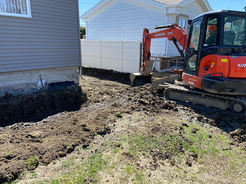 Coule et finition de beton residentiel a Longueuil - Travaux d'excavation, coffrage, installation d'armature, mise en place et finition de béton à Longueuil sur la rive-sud de Montréal