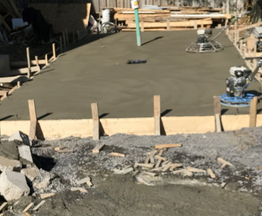 Coule et finition de beton a la machine - Travaux de coule et finition de dalle de béton avec machine aux lame au diamant