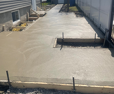 Coule et finition de beton residentiel a Longueuil - Travaux d'excavation, coffrage, installation d'armature, mise en place et finition de béton à Longueuil sur la rive-sud de Montréal